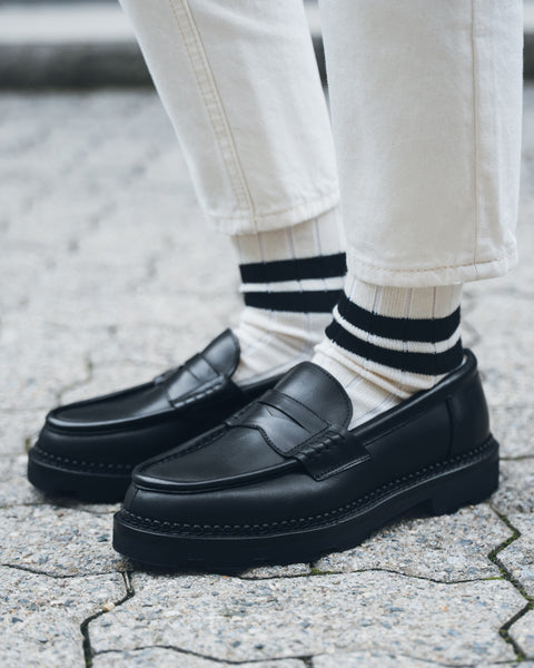 Black penny loafer with a lug sole, for her | Velasca